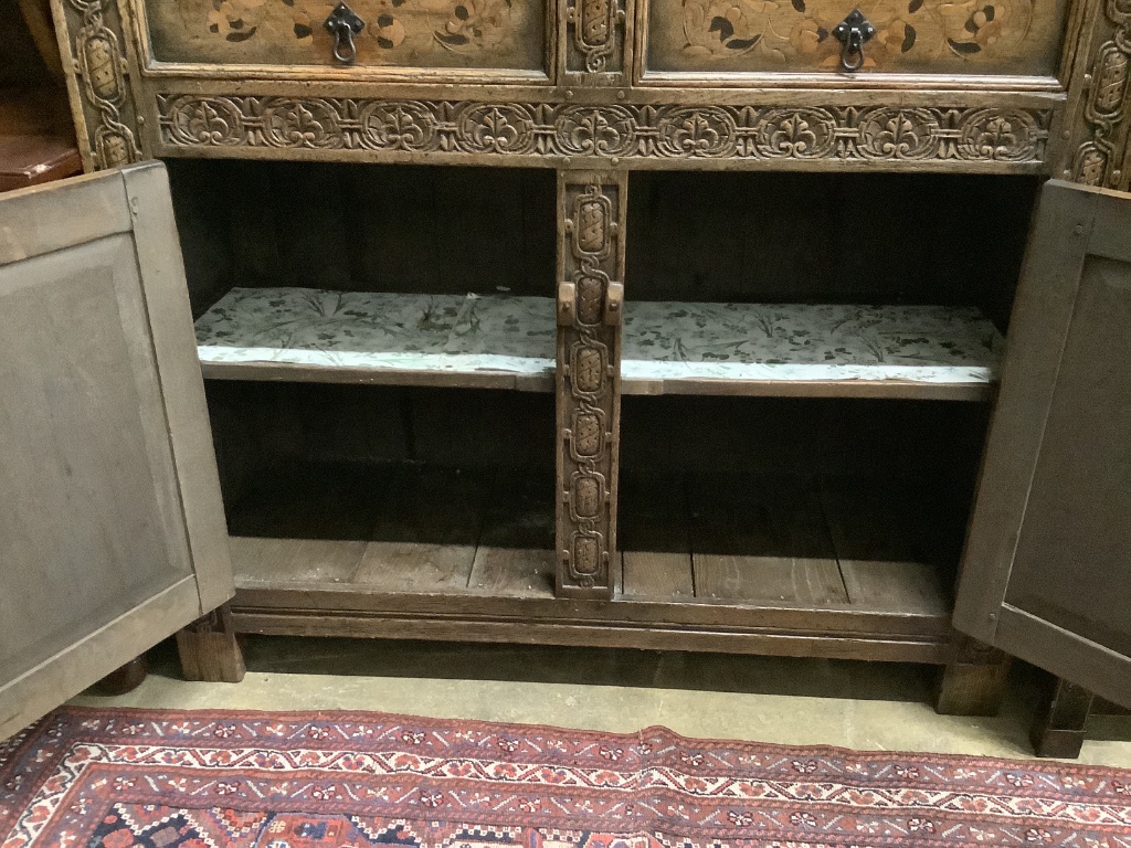 A reproduction 17th century style marquetry inlaid oak court cupboard, length 122cm, depth 43cm, height 155cm